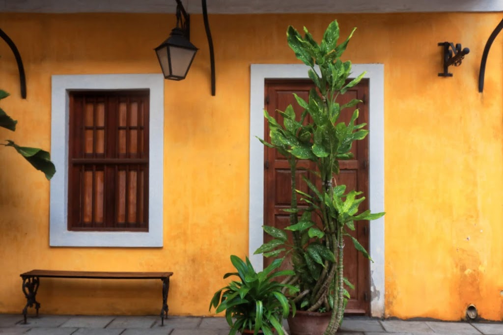 An image from White Town in Pondicherry. Use of vibrant colors to paint the exterior of the buildings make them a feat for the eyes. 