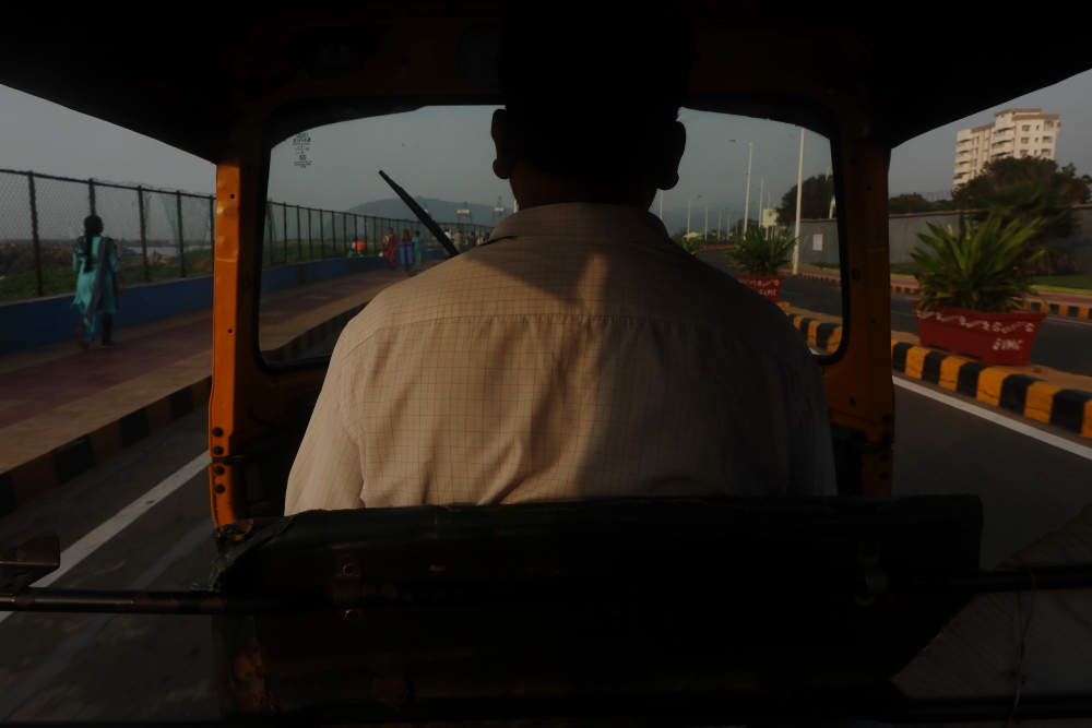 An image taken from inside of an auto-rickshaw in Vizag town. You can easily get an auto-rickshaw anywhere in Vizag city and move between all tourist places you want to see in Vizag.