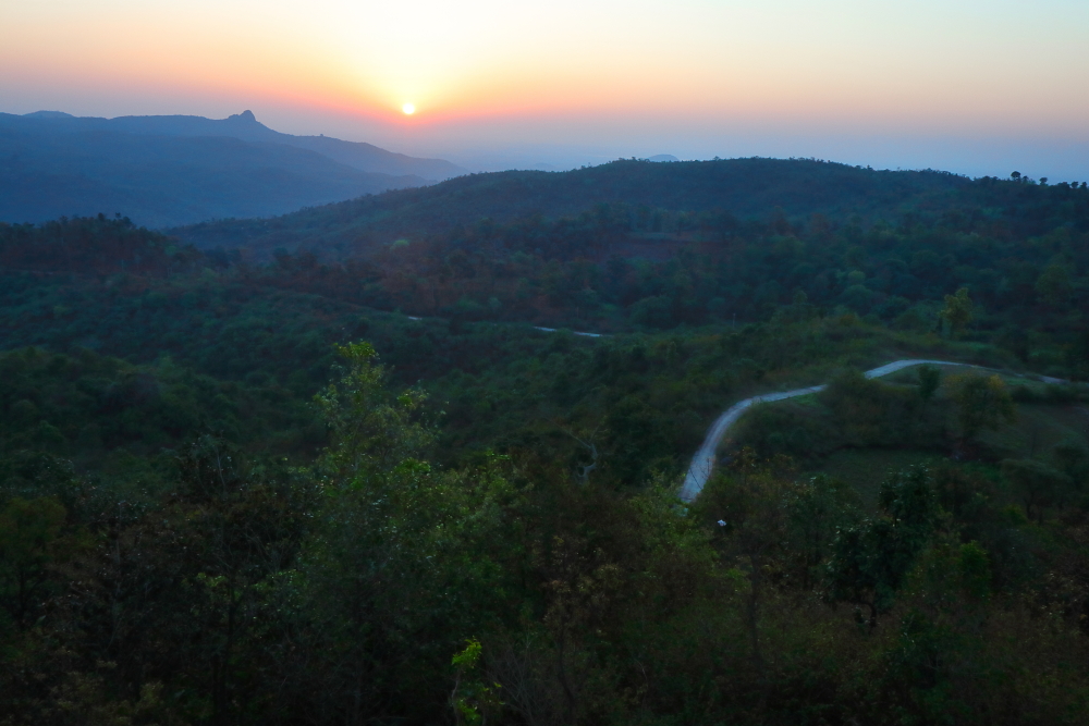 Ajodhya Pahar looking mysterious and magical as the dawn breaks in the hills. The serpentine road trough the forest looks perfect to get lost in Ayodhya Hills in your next weekend trip to Purulia. 