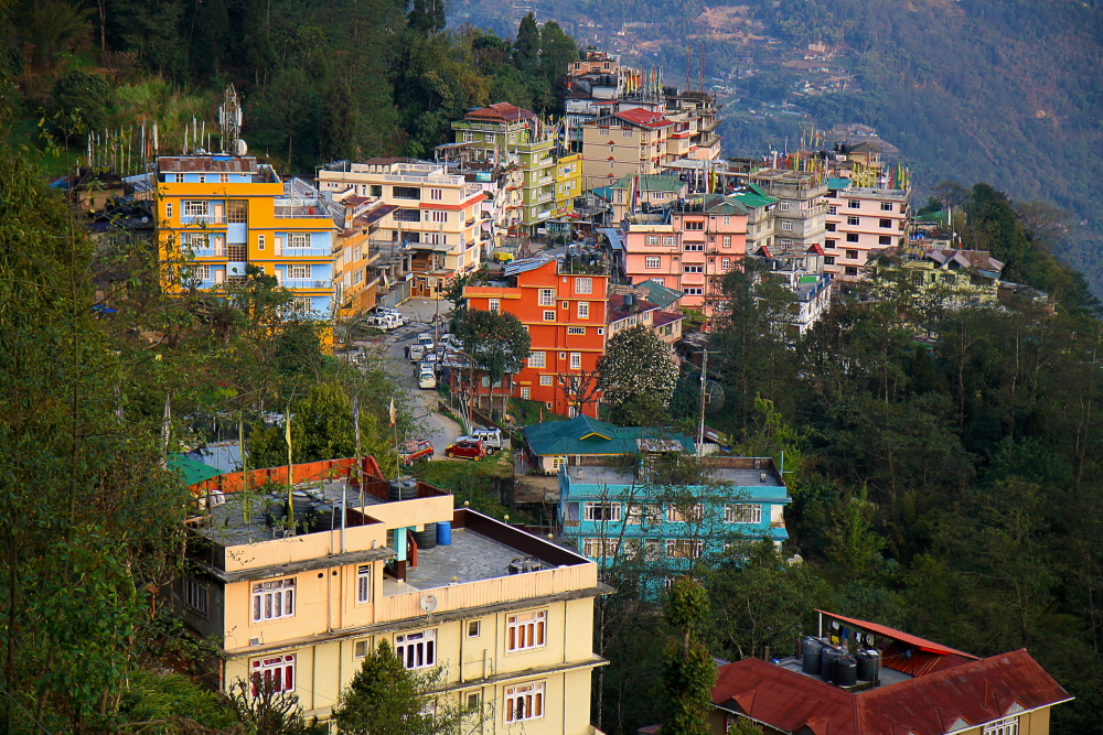 Colorful hotel exteriors in middle and lower Pelling in Sikkim.