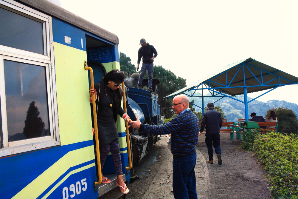 Tourists getting down fro Toy Train to explore Batasia Loop during Darjeeling Joy Ride.