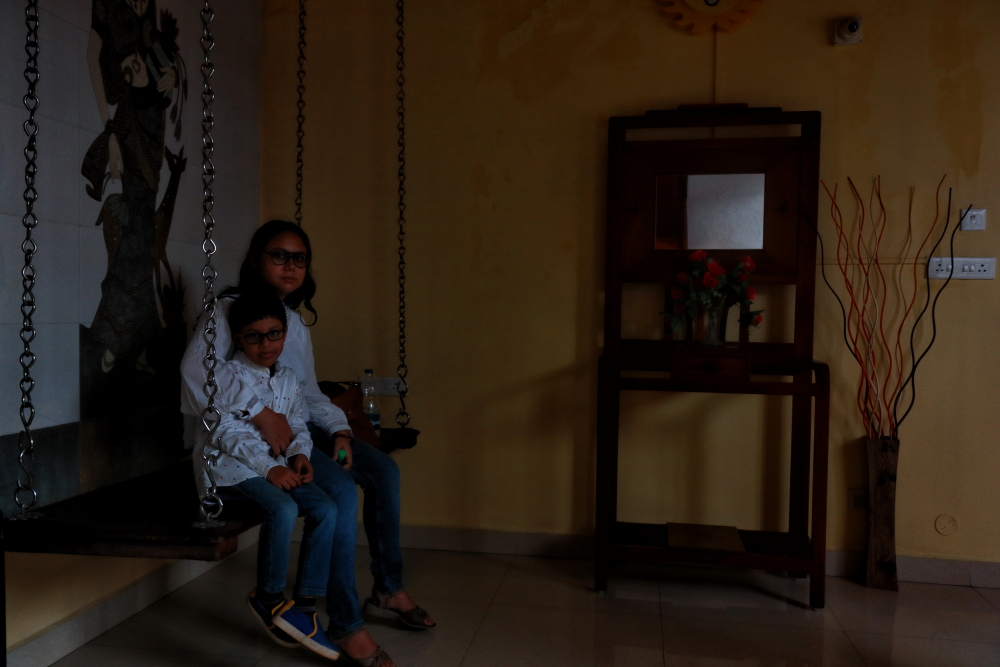 A family photo inside La Maison, our BnB in Pondicherry, India