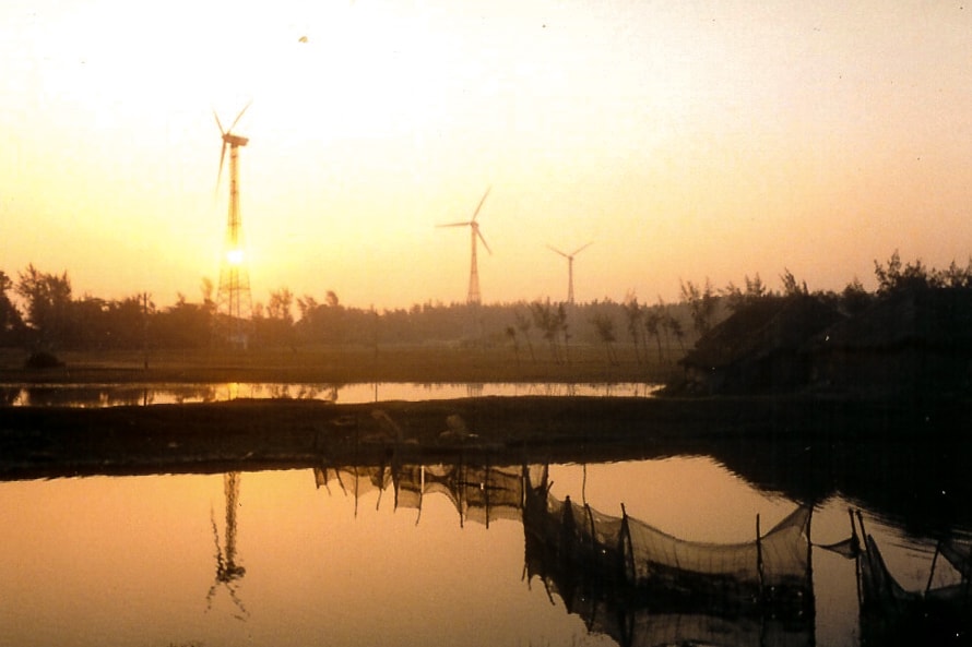 Windmills near Fraserganj seabeach during sunset